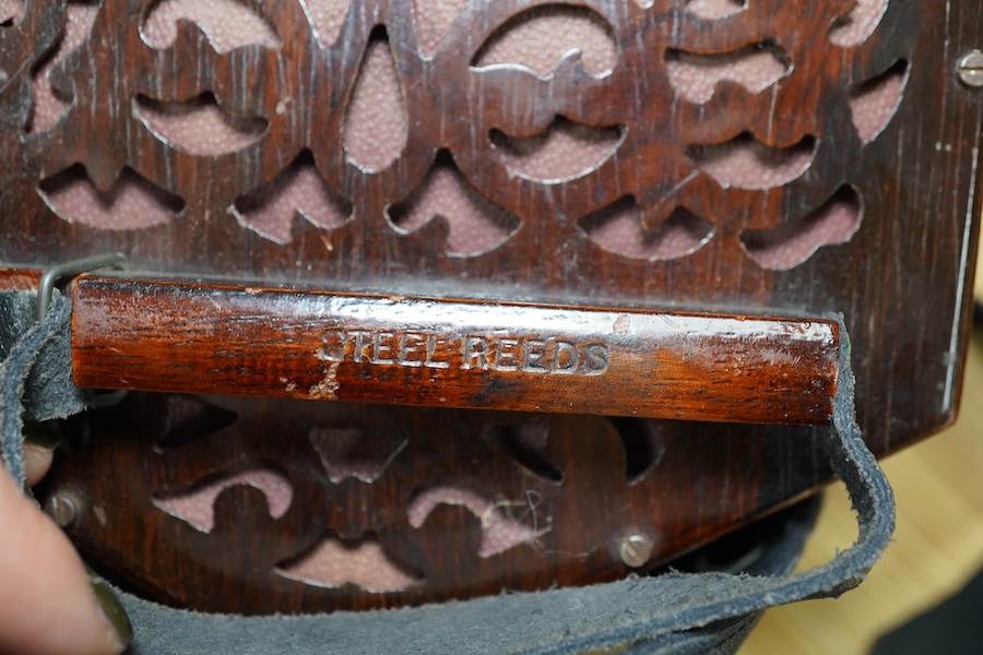 A mid-19th century Lachenal & Co., London mahogany concertina, in an hexagonal mahogany case. Condition - fair to good, the leatherwork on the bellows appears sound and strong.